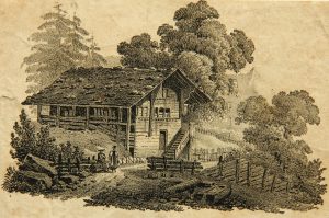 Tiroler Haus und Paar in Tracht