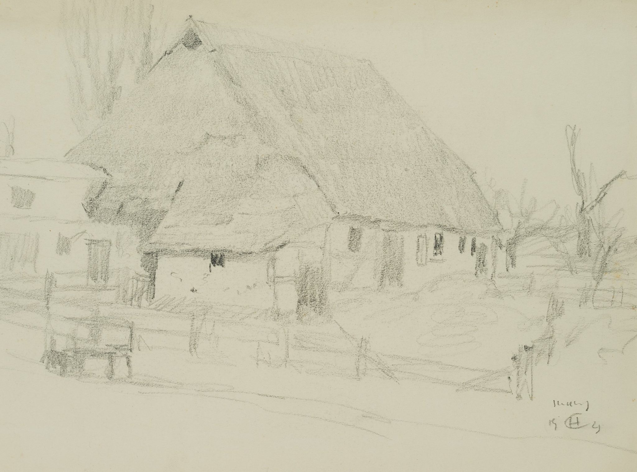 Reetdachhaus mit Holzzaun