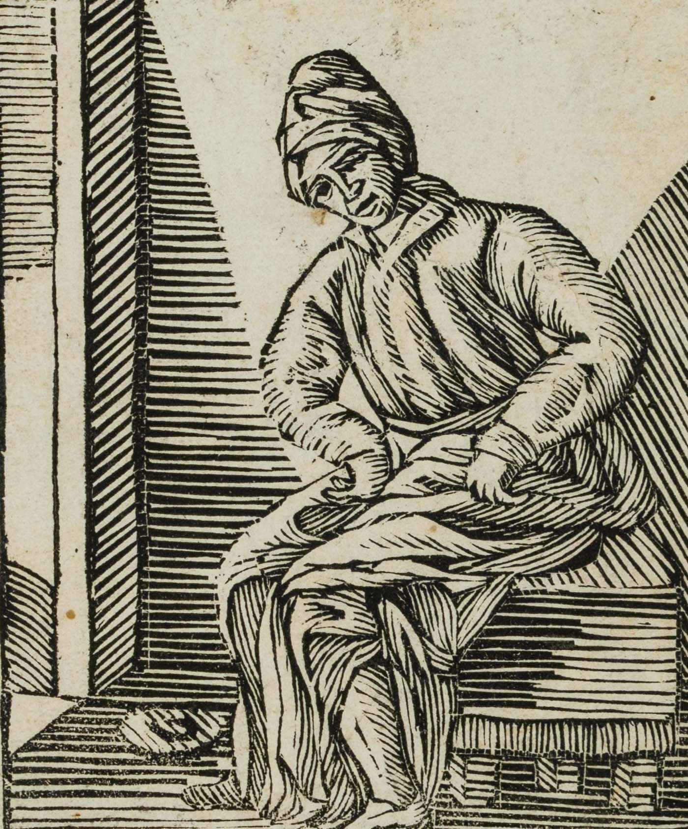 Frau, auf einem Nachtstuhl sitzend