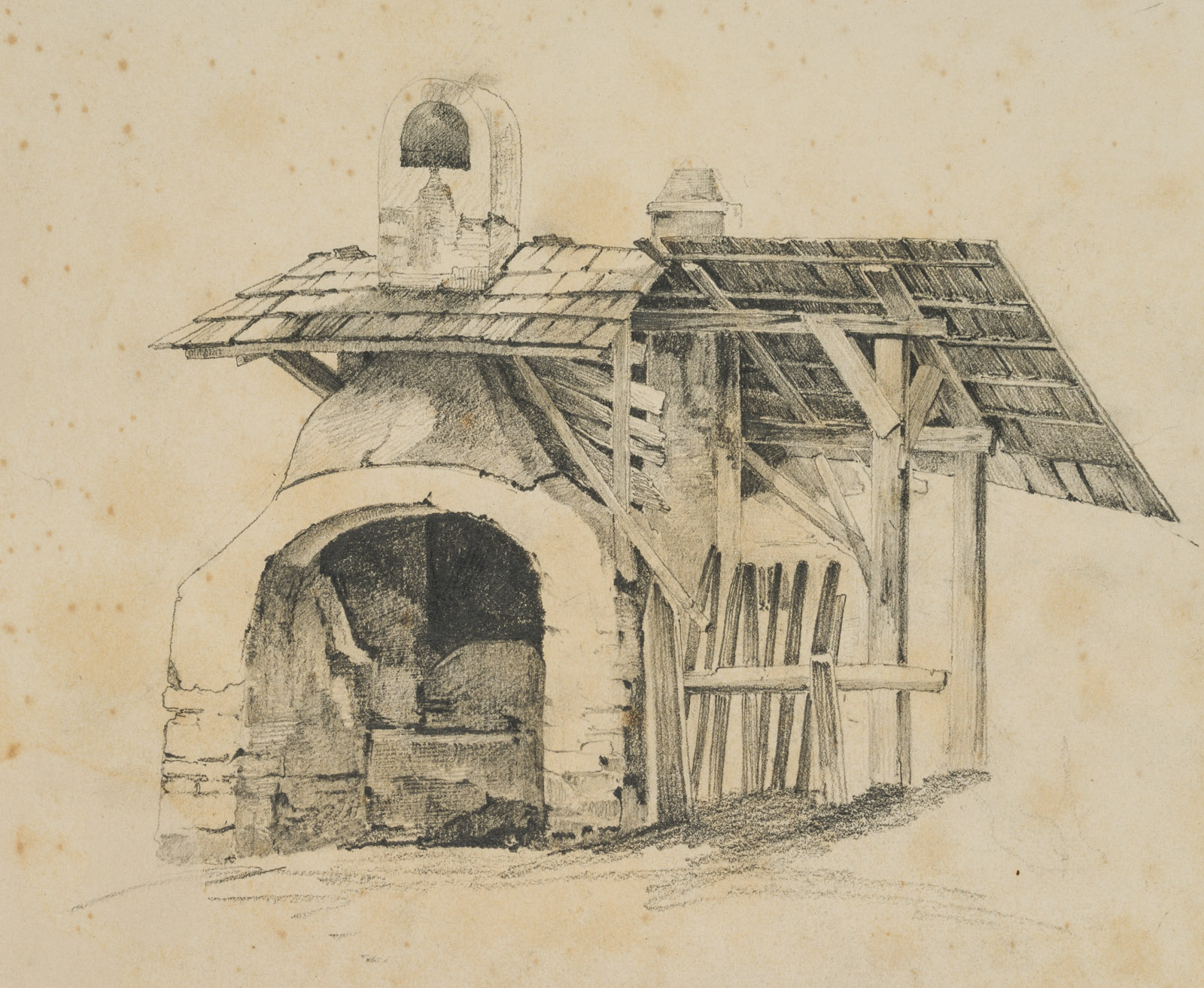 Steinkamin und Holzverschlag