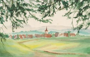 Dorf in frühlingsfarbenen Wiesen