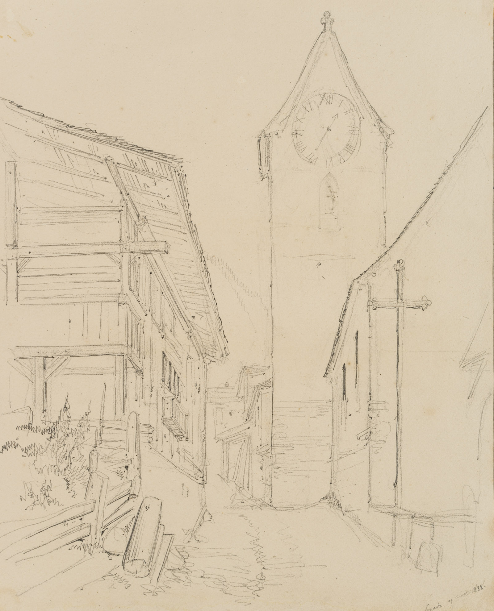 Pfarrturm in Gasse eines Dorfes