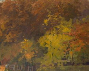 Herbstblätter vor Haus mit Giebel