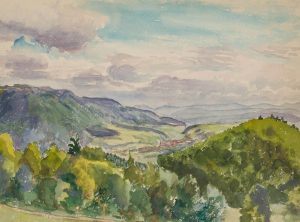 Alpen mit Dorf im Tal