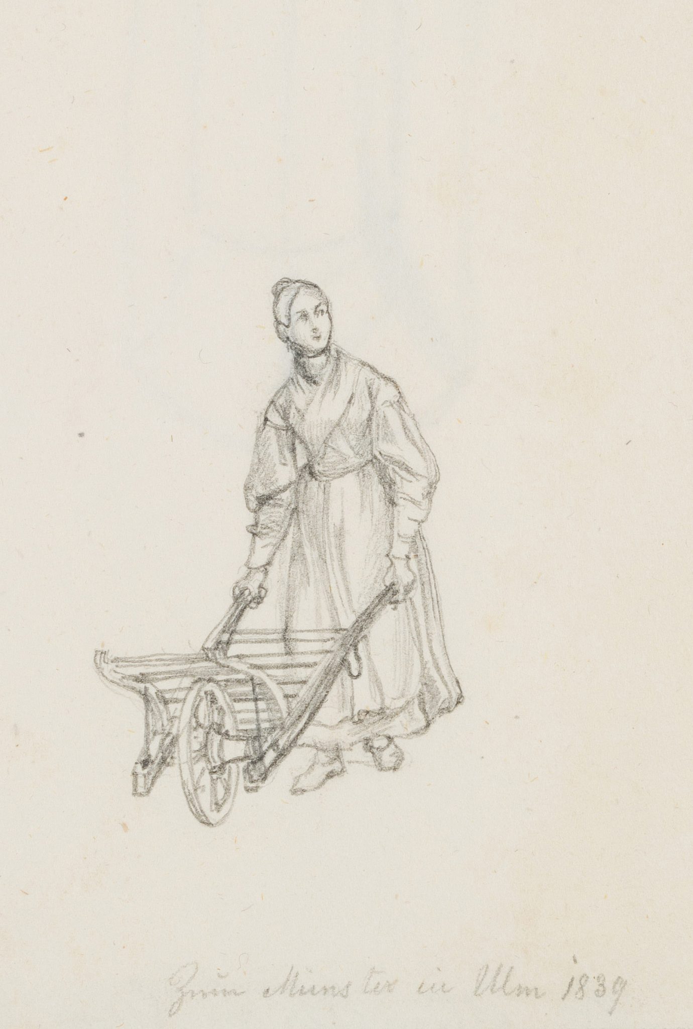 Frau mit Schubkarre