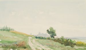 Feldweg mit Stadt in der Ferne
