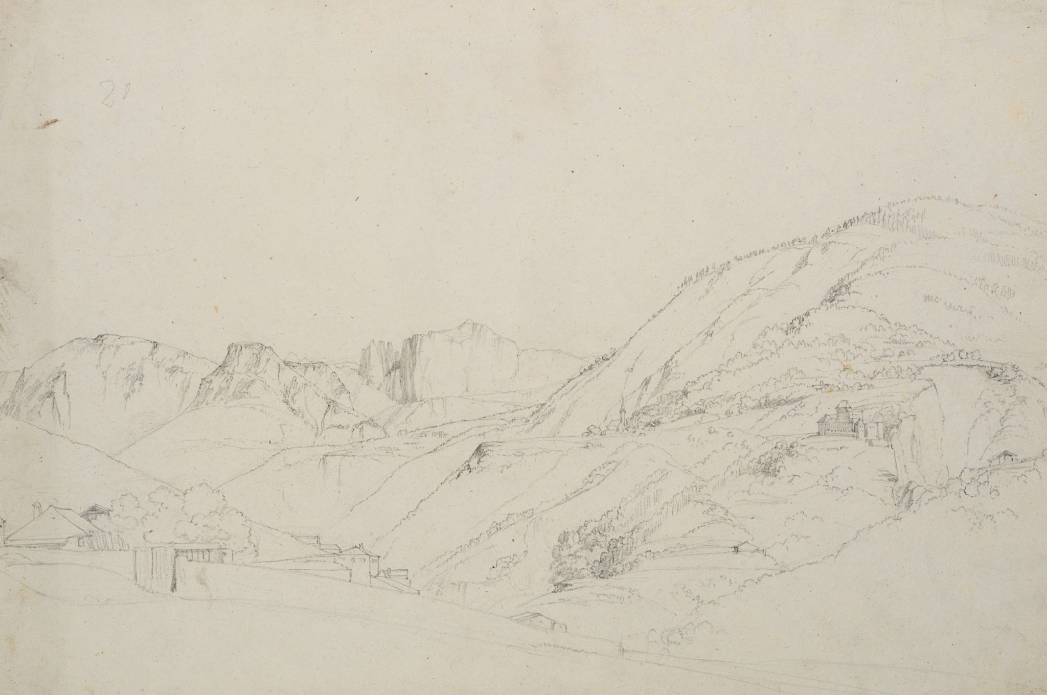 Blick auf Hochland mit kleinen Ortschaften und Gebirgsfelsen
