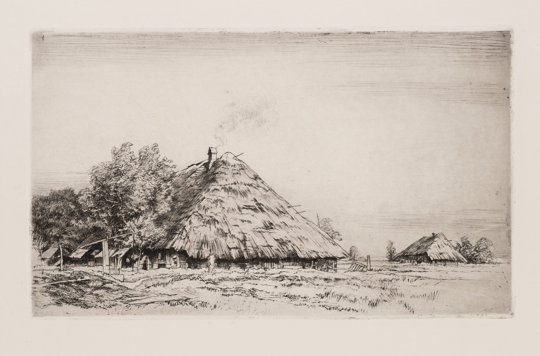 Landschaft mit strohgedeckten Scheunen
