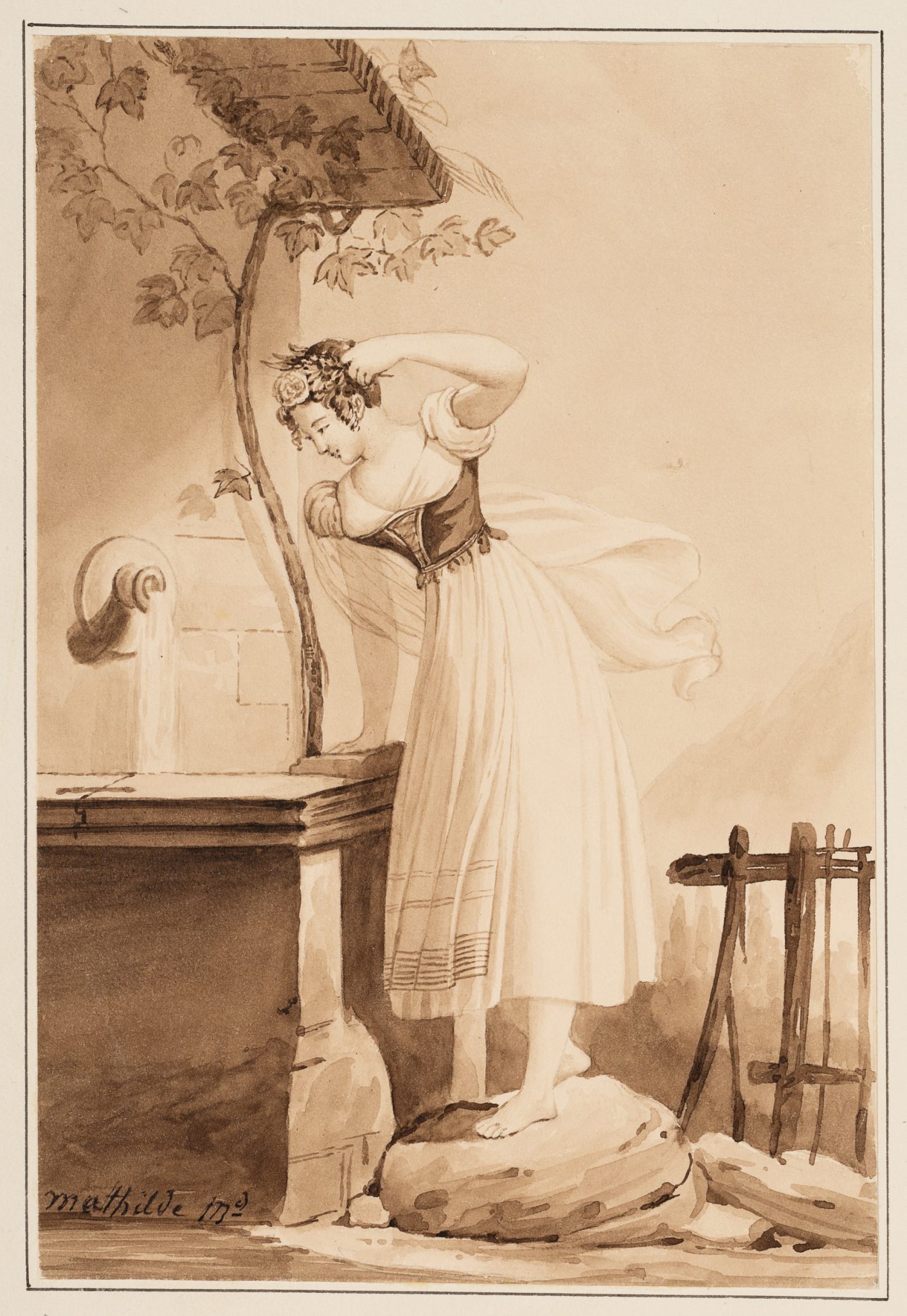 Junge Frau am Brunnen