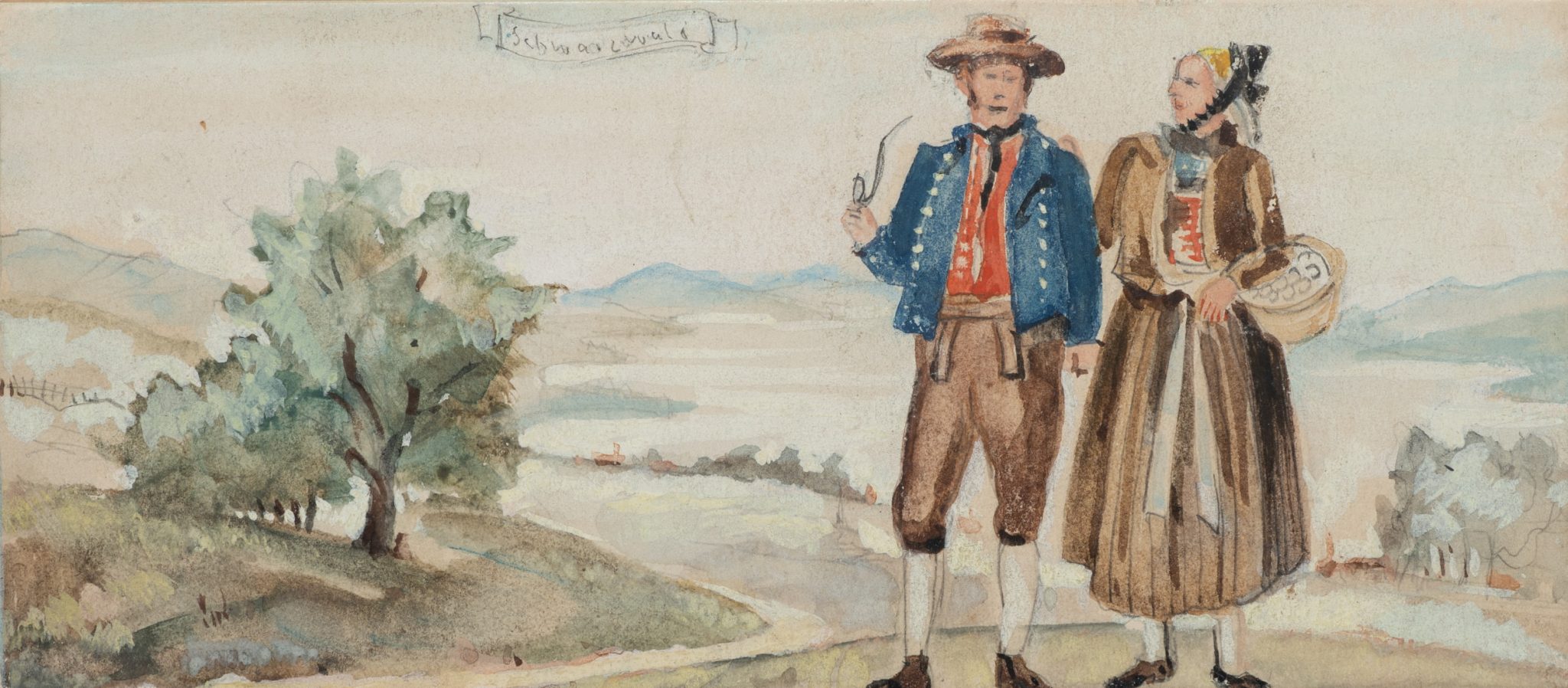 Paar in Schwarzwälder Tracht in Landschaft
