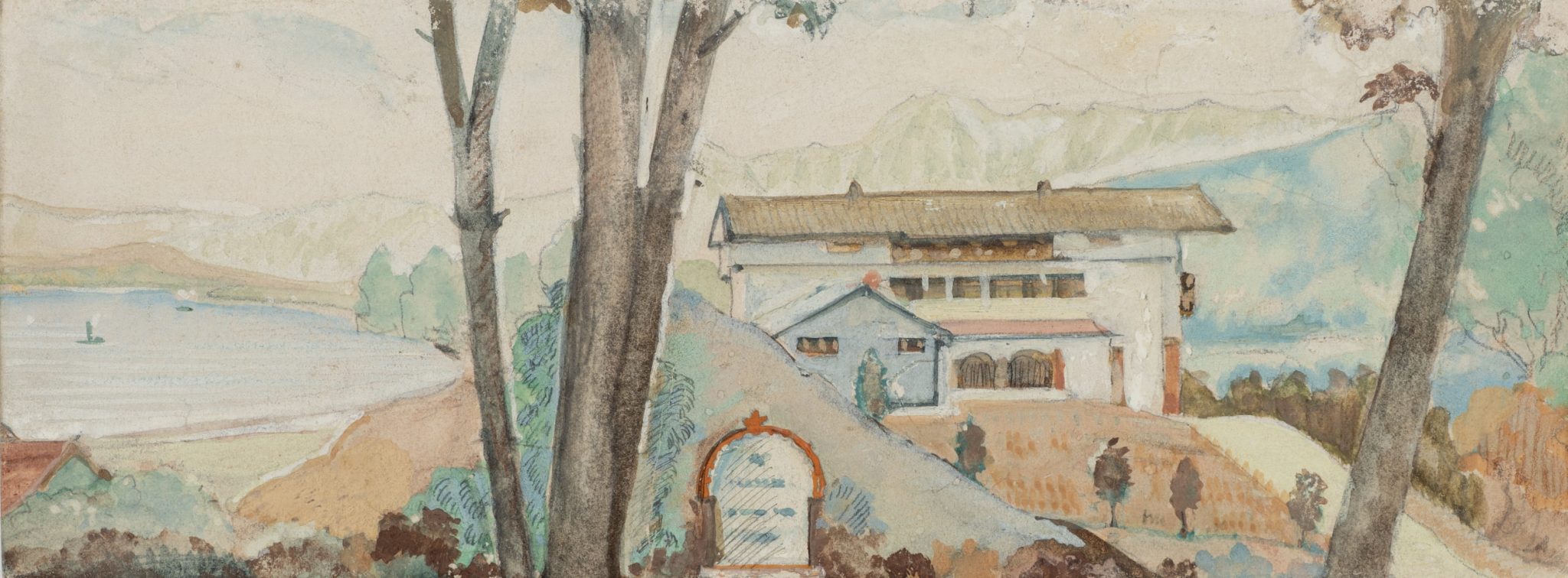 Haus am See mit Bergen