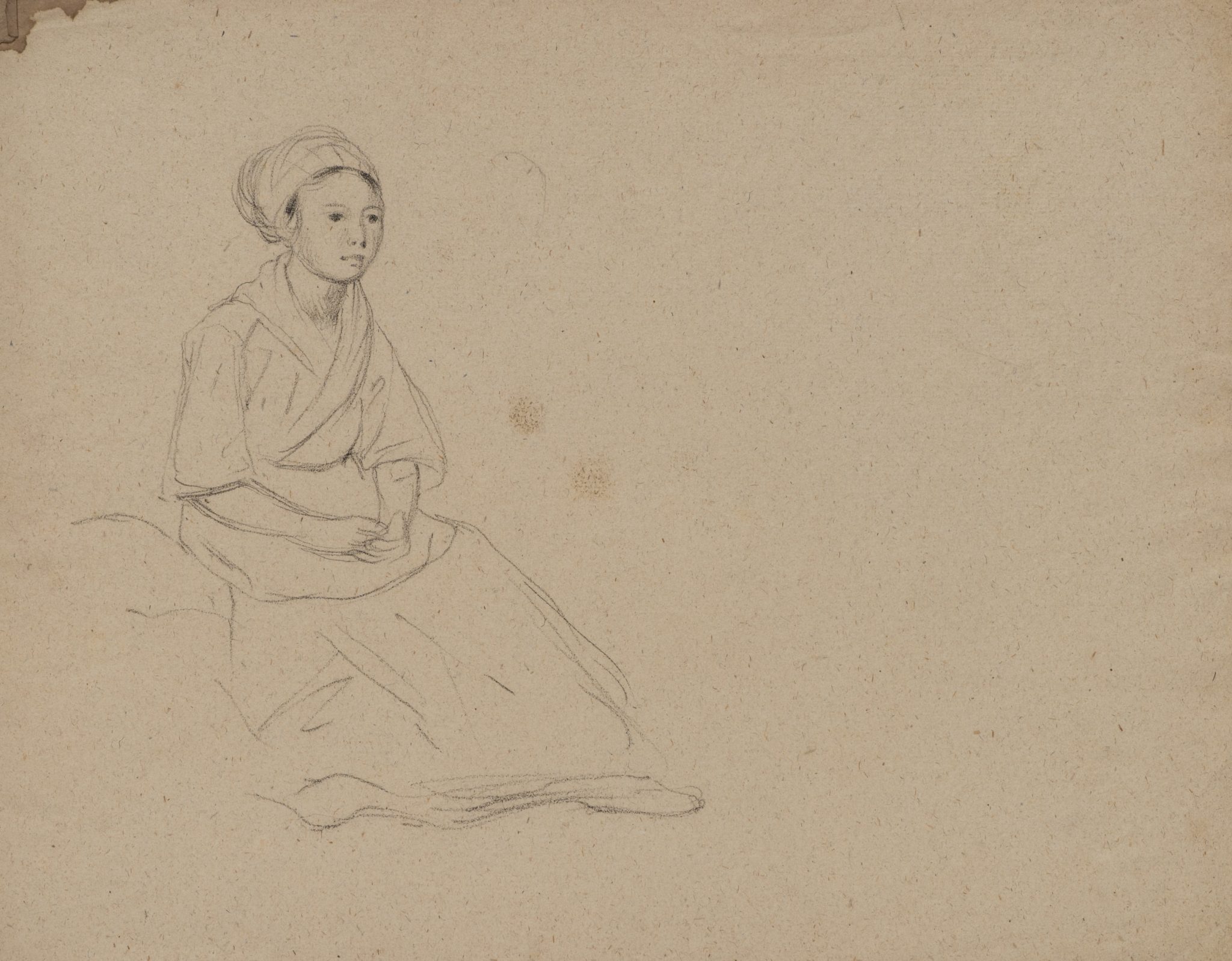 Sitzende Frau