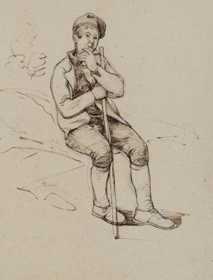 Junger Mann auf Felsen